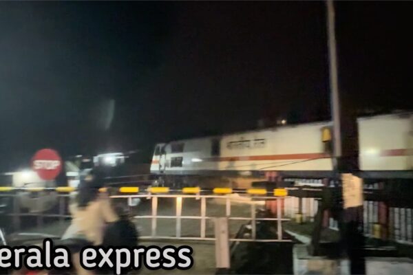 🚦 Kerala Express WAP7 Powers Past Mankara Level Crossing & Incredible Railway Upgrade #trainvideos Kerala express crossing a rail road crossing in Palakkad Mankara